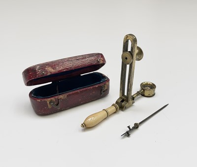Lot 569 - A George III ivory and brass...