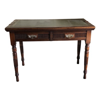 Lot 3383 - An Edwardian mahogany writing desk, the green...