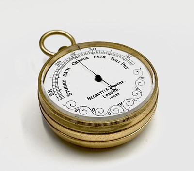 Lot 576 - A Negretti & Zambra gilt cased aneroid...