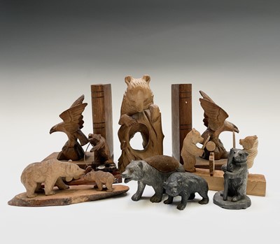 Lot 317 - A Russian carved wood figure of a bear, a pair...