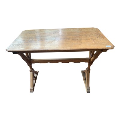 Lot 3397 - A Puginesque light oak Gothic table with X...