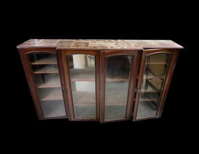 Lot 3137 - An Edwardian walnut breakfront bookcase, with...