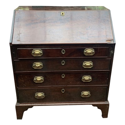 Lot 3331 - A George III mahogany bureau, the fall front...