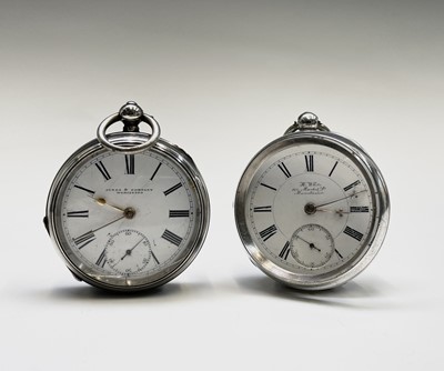 Lot 43 - Two silver key wind pocket watches The first...