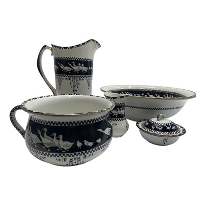 Lot 915 - A Soho Pottery Solian Ware toilet set, c. 1913-...