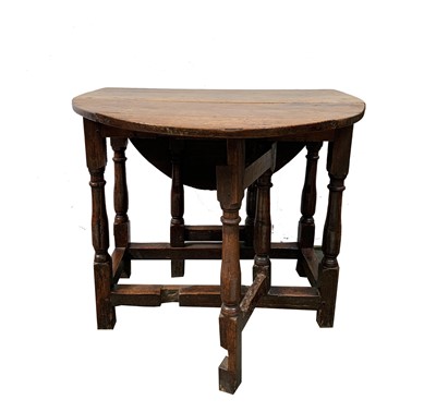 Lot 112 - A George I oak gateleg table, of small...