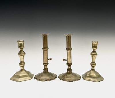Lot 163 - A near pair of George III brass ejector...