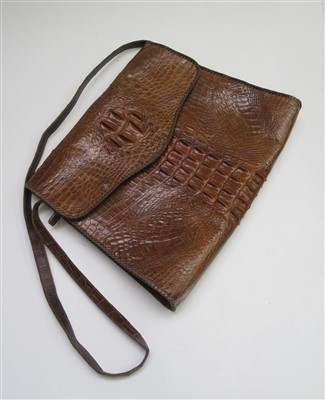 Lot 58 - A 1940s crocodile skin handbag and a crocodile...