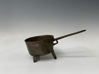 Lot 180 - A bronze skillet, 18th century, height 14.5cm,...