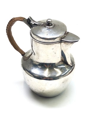 Lot 2022 - A French silver lidded jug with wicker bound...