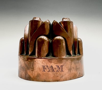 Lot 166 - A Victorian copper jelly mould, initialled F.A....
