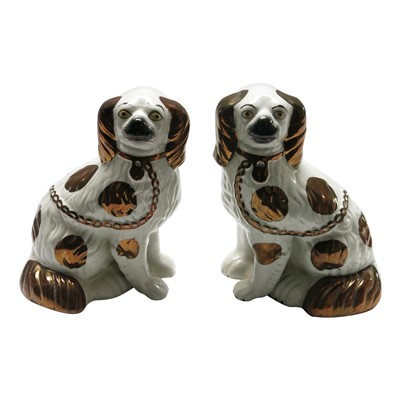 Lot 995 - A pair of 19th century Staffordshire spaniel...