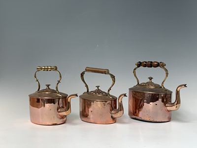 Lot 167 - Three Victorian copper kettles, the largest...