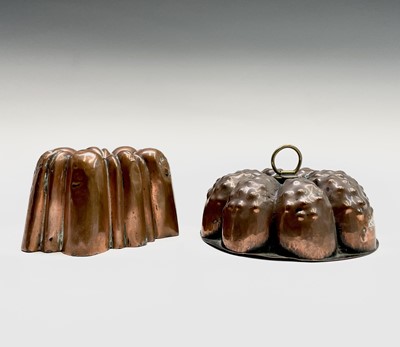 Lot 168 - Two Victorian copper jelly moulds, one with a...