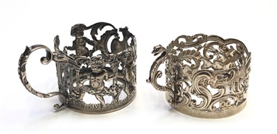 Lot 2045 - Two pierced silver glass holders each repousse...