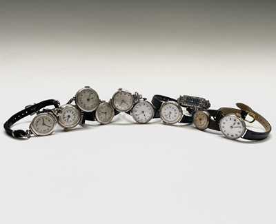 Lot 47 - Ten ladies silver cased wristwatches.