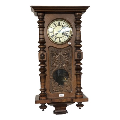 Lot 3041 - A walnut and stained beech Vienna type wall...
