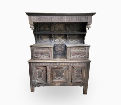 Lot 118 - A carved oak tridarn, 17th century, the top...