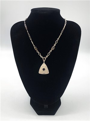 Lot 2423 - An Arts and Crafts silver necklace set with...