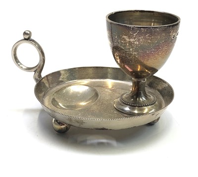 Lot 2035 - A silver Mappin & Webb individual egg cup and...