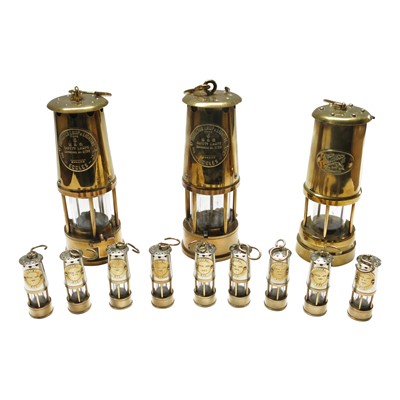 Lot 313 - Three brass miner's safety lamps by ECCLES The...