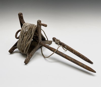 Lot 59 - A cast iron groundsman's swivel line marker....