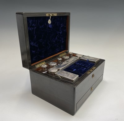 Lot 168 - A Victorian rosewood veneered toilet case, the...