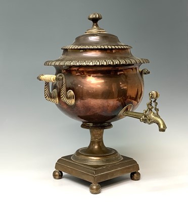 Lot 358 - A Regency copper tea urn, with brass tap,...