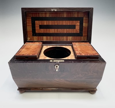 Lot 69 - A George III mahogany sarcophagus form tea...