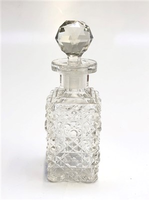 Lot 1029 - A cut-glass perfume bottle and stopper, early...