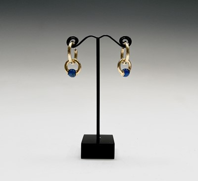Lot 41 - A pair of 18ct gold double hoop designer...