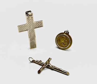 Lot 12 - A 9ct gold cross a 9ct gold crucifix and a...