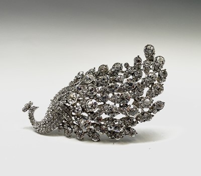 Lot 58 - A fabulous and outlandish peacock brooch...