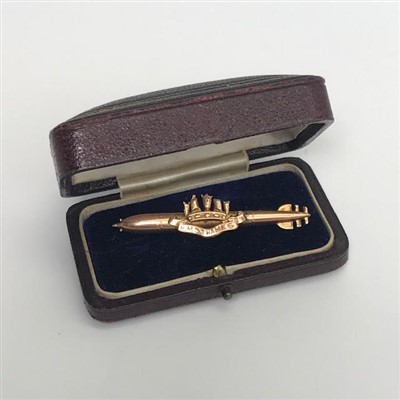 Lot 2404 - A rose gold pin in the form of the submarine...