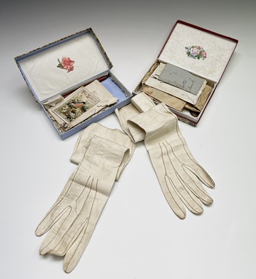 Lot 55 - A box containing a collection of locks of hair,...