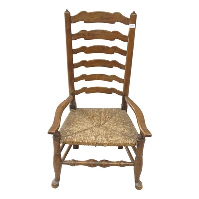 Lot 3321 - An ash and elm ladderback armchair, 19th...