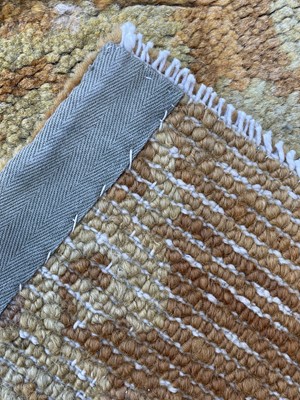 Lot 1279 - A Chinese rectangular rug fragment, 19th...