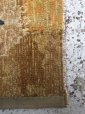 Lot 1279 - A Chinese rectangular rug fragment, 19th...