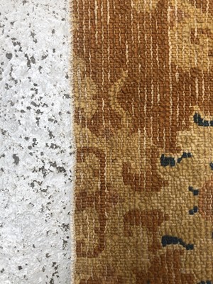 Lot 1279 - A Chinese rectangular rug fragment, 19th...