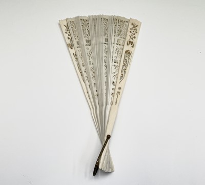 Lot 363 - A Chinese ivory fan, circa 1920, with foliate...