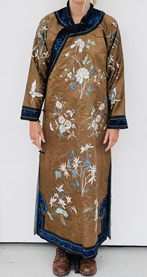 Lot 375 - A Chinese silk embroidered robe, 19th century,...