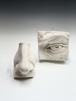 Lot 1084 - Two plaster moulds, one of an eye the other a...