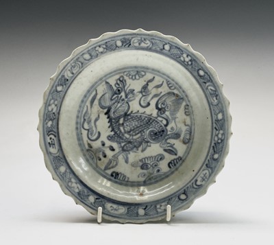 Lot 31 - A Chinese blue and white dish, Ming Dynasty,...