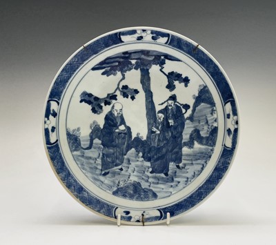 Lot 28 - A Chinese porcelain blue and white charger,...