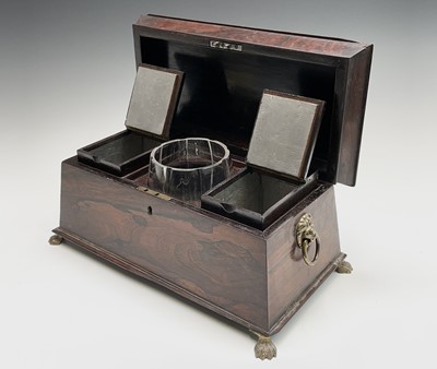 Lot 13 - A Regency rosewood tea caddy, of sarcophagus...