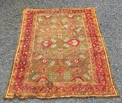 Lot 1272 - An Ushak carpet, West Anatolia, the green...