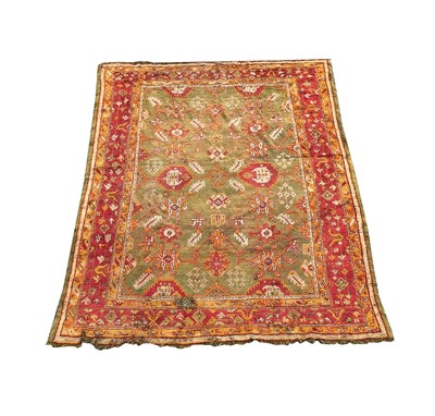 Lot 1272 - An Ushak carpet, West Anatolia, the green...