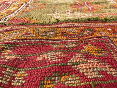 Lot 1272 - An Ushak carpet, West Anatolia, the green...