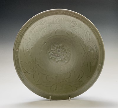 Lot 7 - A Chinese Chekian Celadon dish, late Ming...