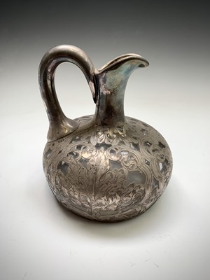 Lot 31 - A handsome but damaged silver encased glass...